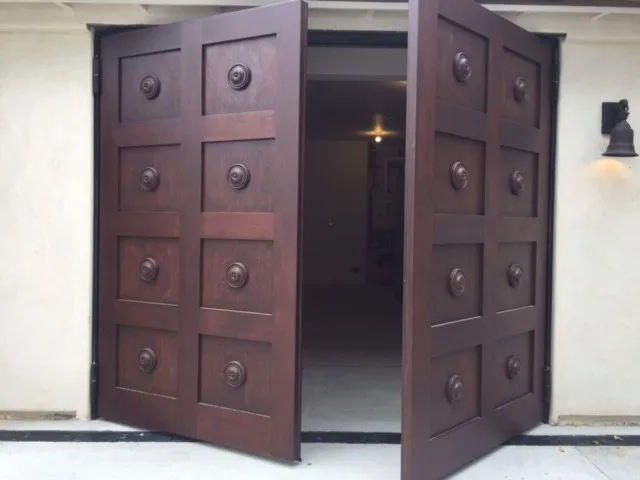 Personalized Wooden Garage Doors by Gates Doors & Ironworks - Photo 10