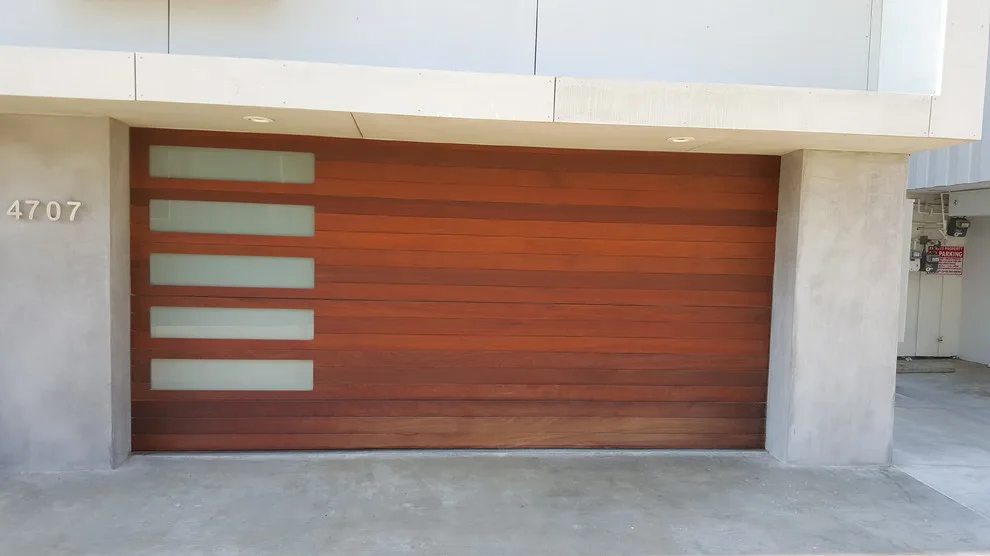 Personalized Wooden Garage Doors by Gates Doors & Ironworks - Photo 3
