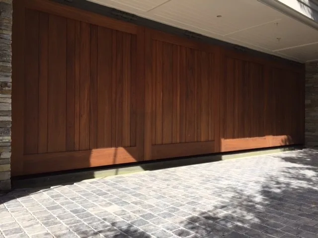 Personalized Wooden Garage Doors by Gates Doors & Ironworks - Photo 30