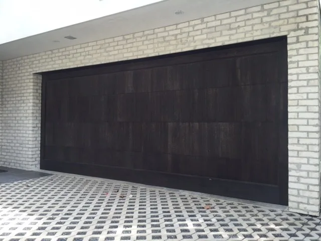 Personalized Wooden Garage Doors by Gates Doors & Ironworks - Photo 15