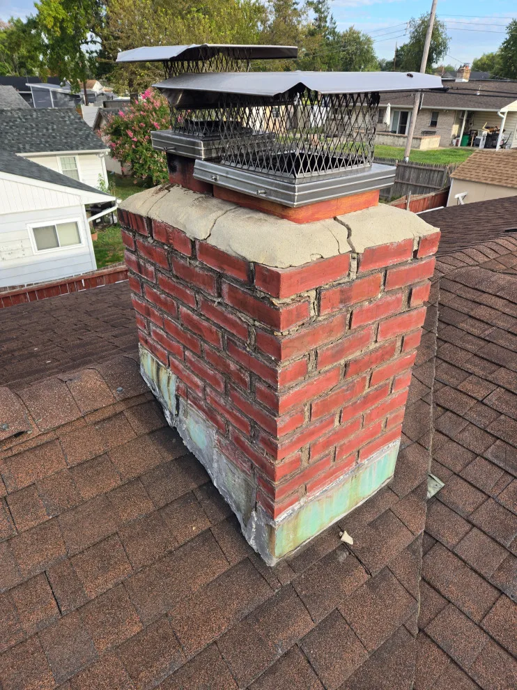 Chimney refurbishment by Charming Exteriors, LLC - Photo 6