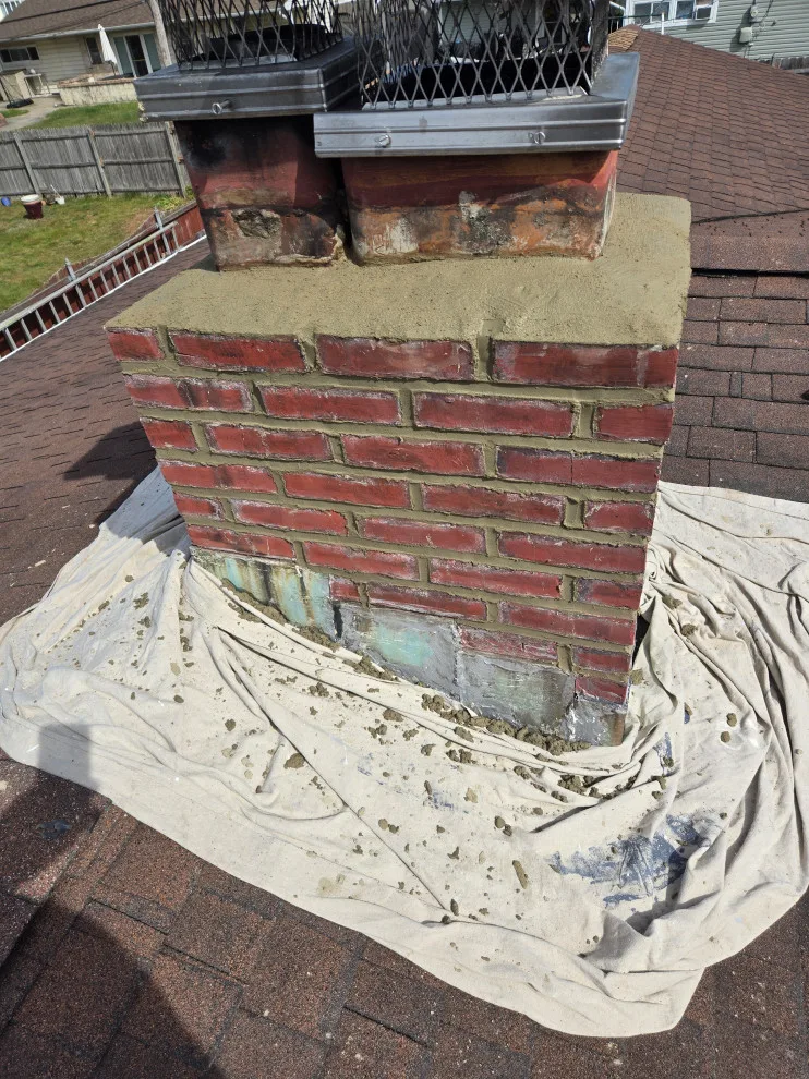 Chimney refurbishment by Charming Exteriors, LLC - Photo 2