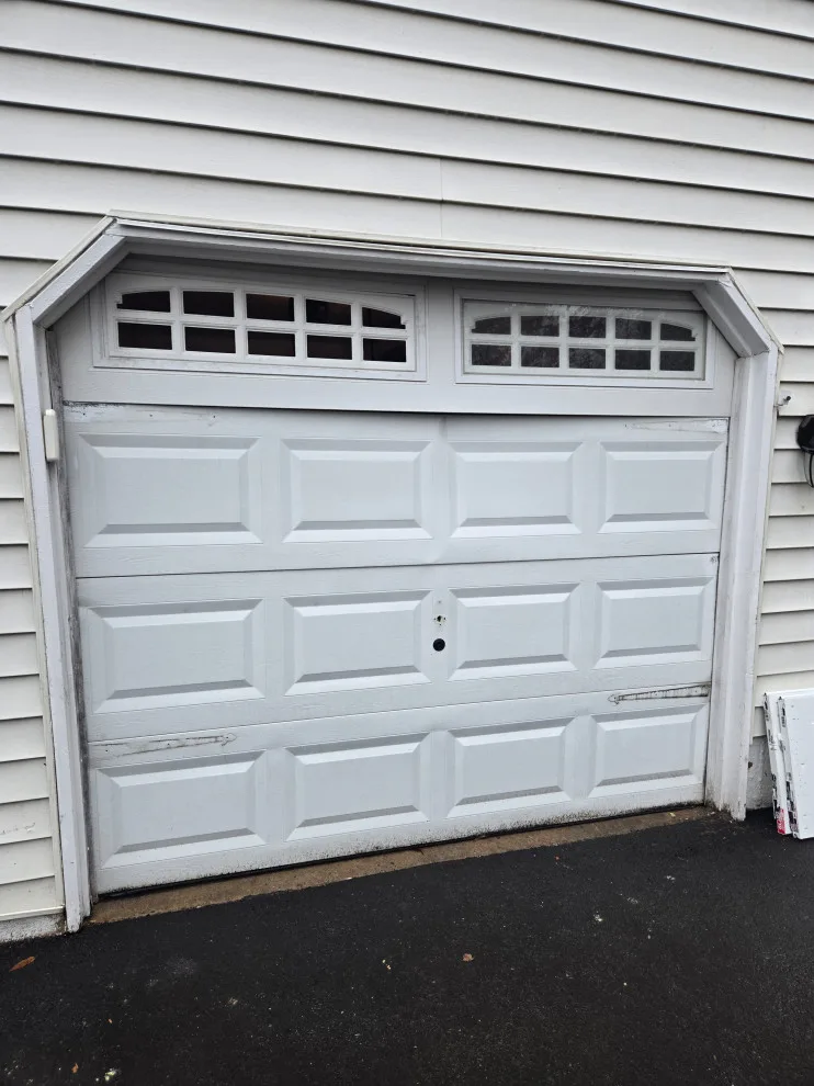 Two garage doors and openers by Charming Exteriors, LLC - Photo 14