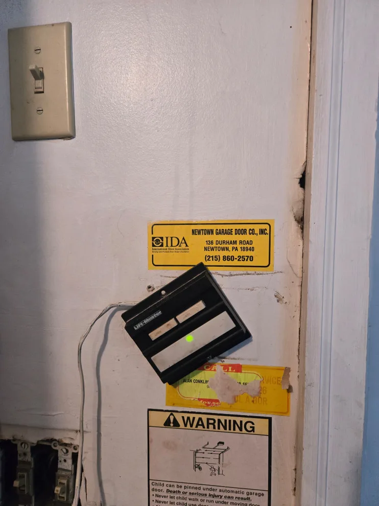 Two garage doors and openers by Charming Exteriors, LLC - Photo 18