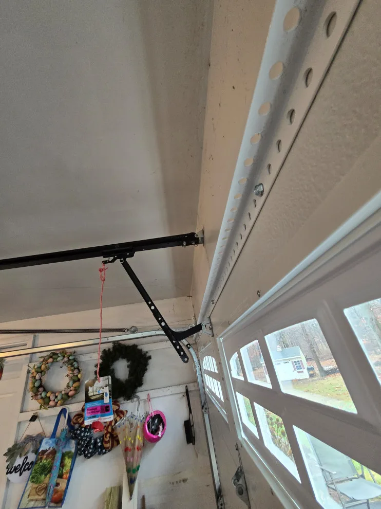 Two garage doors and openers by Charming Exteriors, LLC - Photo 2