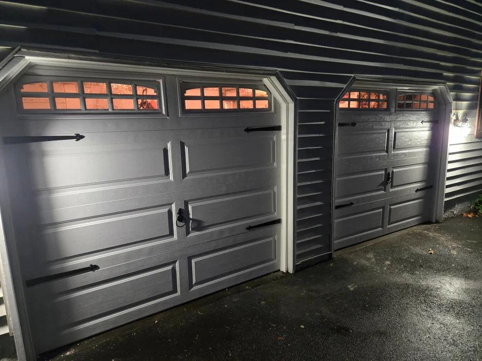 Two garage doors and openers by Charming Exteriors, LLC - Photo 12