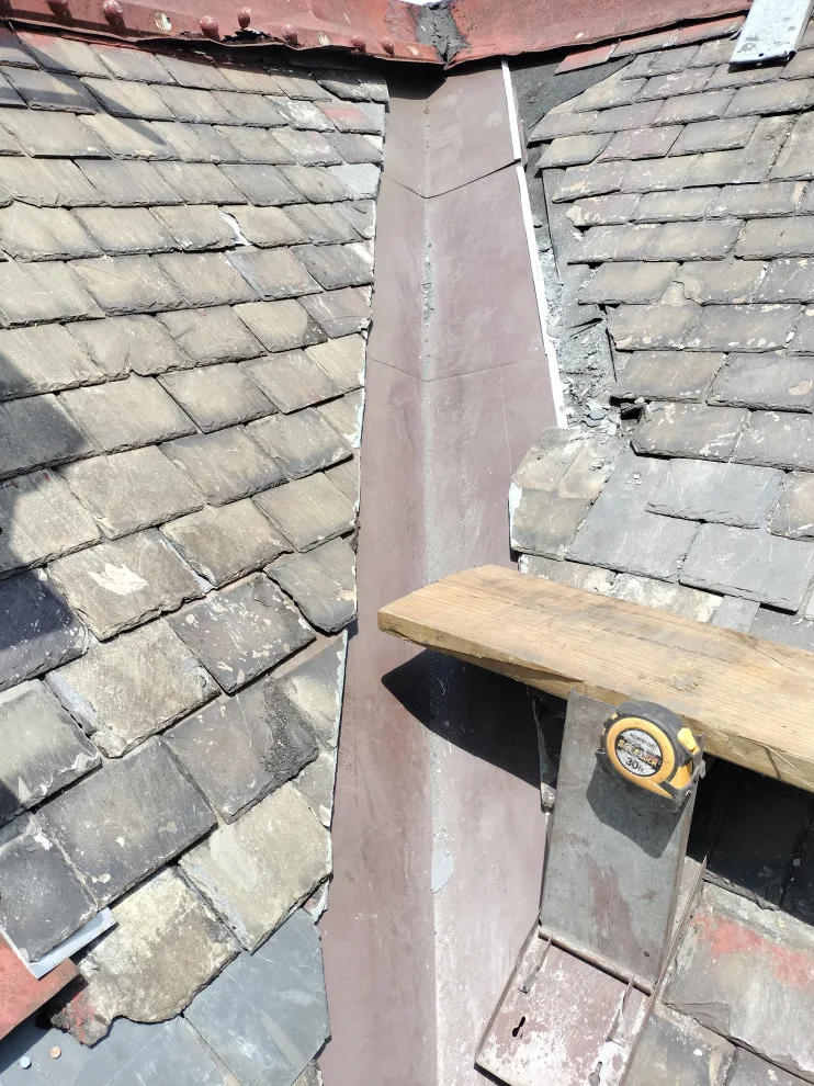 Slate roof refurbishment by Charming Exteriors, LLC - Photo 3
