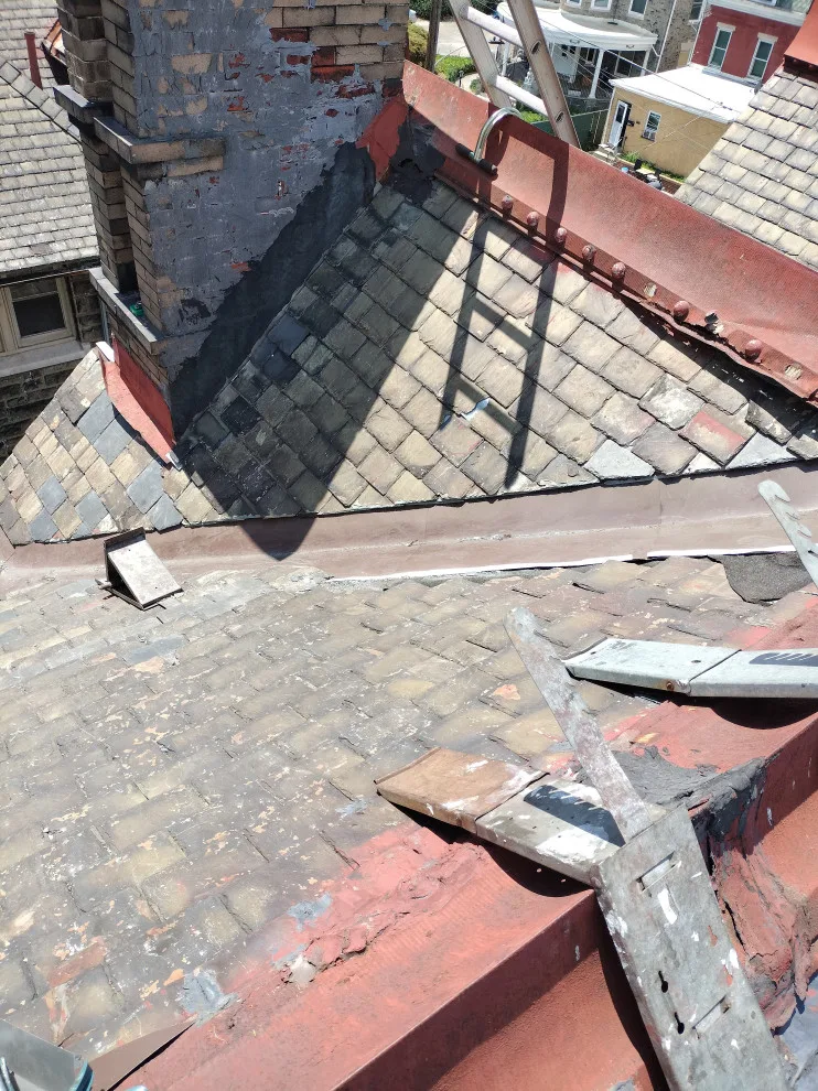 Slate roof refurbishment by Charming Exteriors, LLC - Photo 8