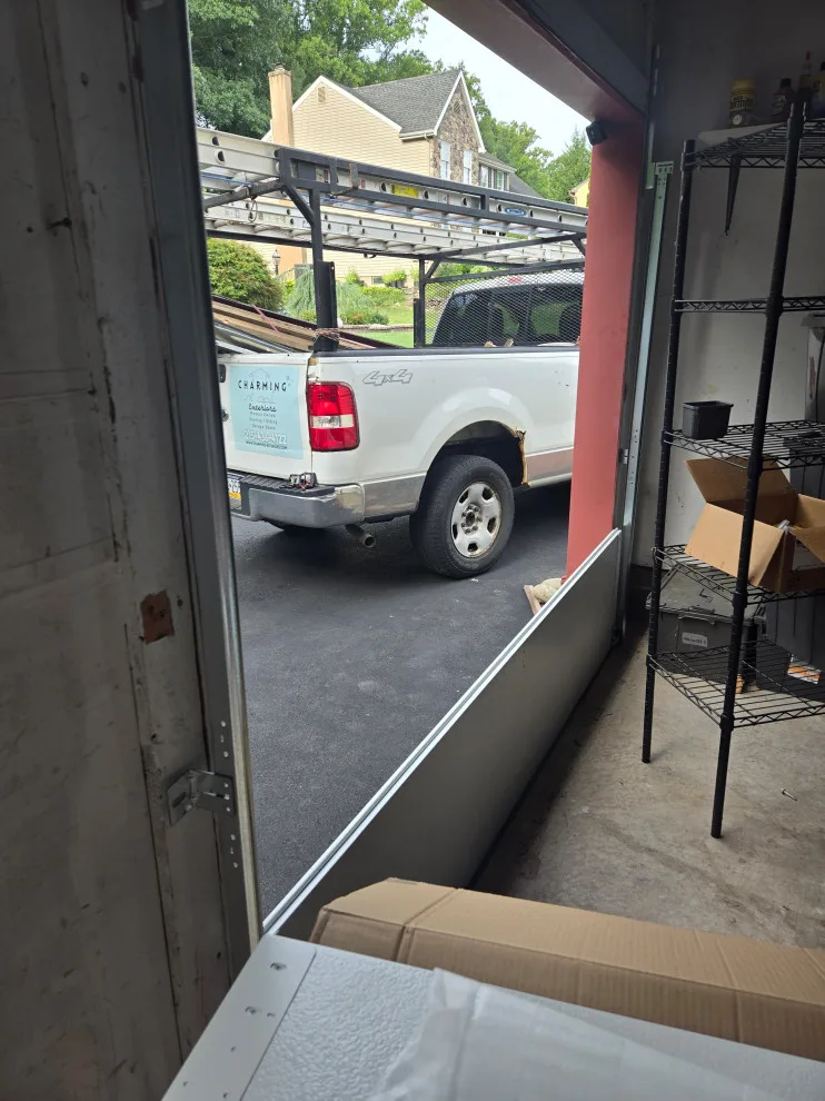 Upgraded garage doors and openers by Charming Exteriors, LLC - Photo 10