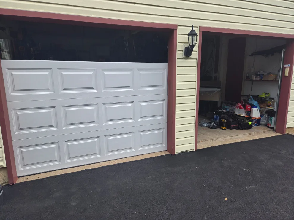 Upgraded garage doors and openers by Charming Exteriors, LLC - Photo 9