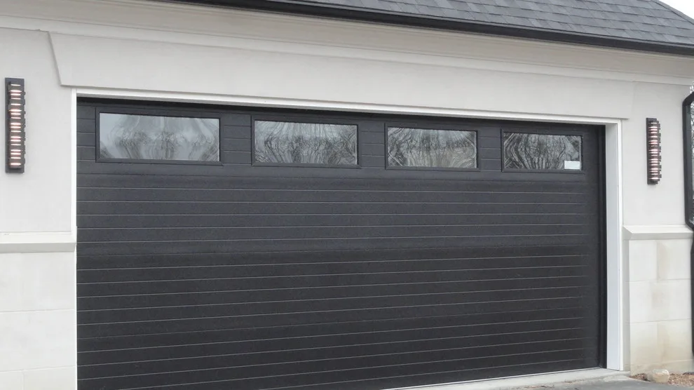 Contemporary Steel Door Installations by Clopay by Tarnow Doors, Inc. - Photo 3