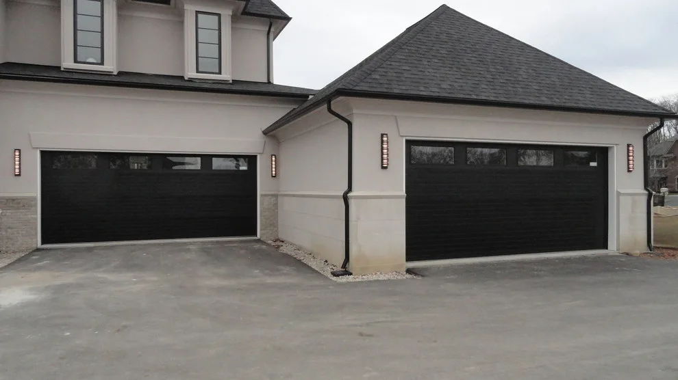 Contemporary Steel Door Installations by Clopay by Tarnow Doors, Inc. - Photo 2