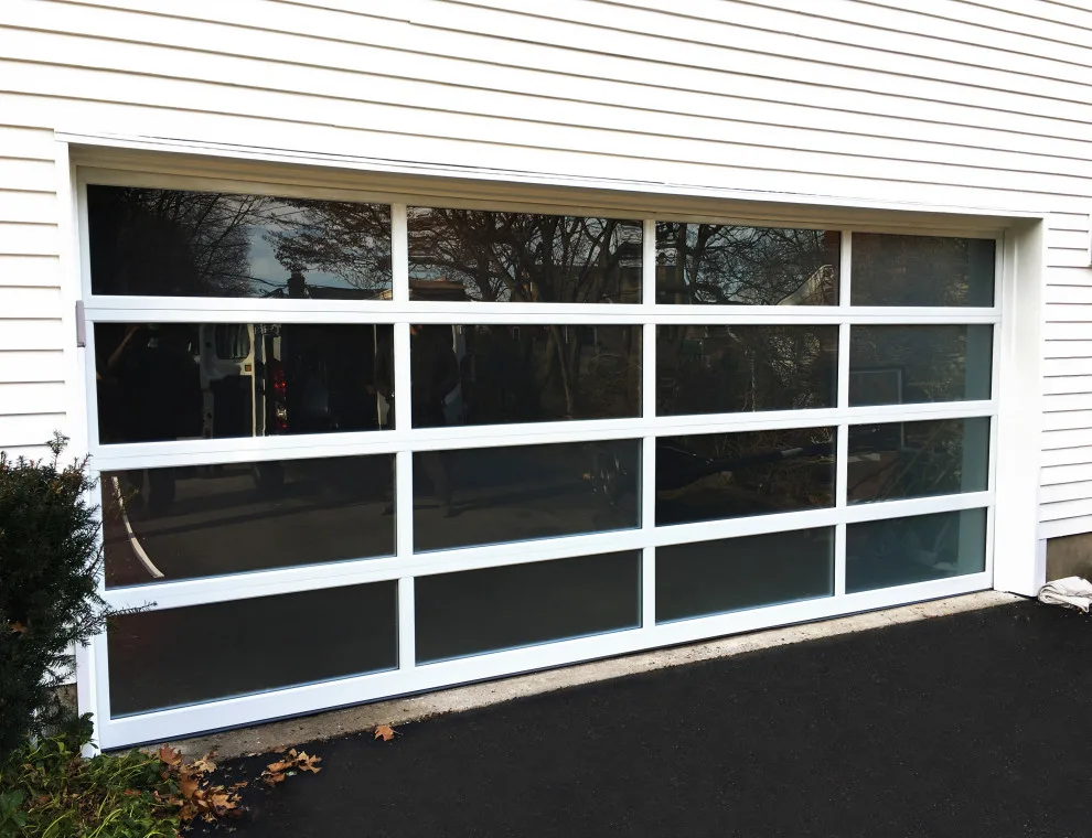 White Garage Door with Clear Glass Full View by Precision Garage Door Service - Photo 2