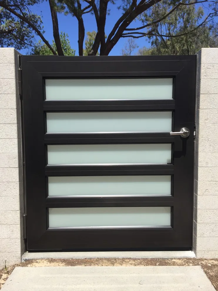 Framed Garage Doors with Glass and Aluminum by Gates Doors & Ironworks - Photo 11