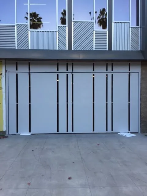 Contemporary Garage Entrance by Gates Doors & Ironworks - Photo 2