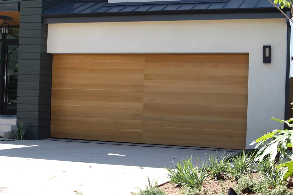 Contemporary glass garage door by Ziegler Doors Inc. - Photo 2
