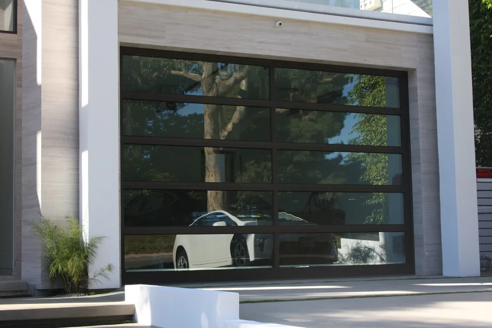 Contemporary glass garage door by Ziegler Doors Inc. - Photo 4