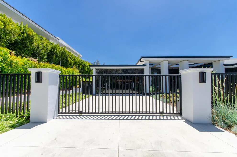 Contemporary Steel Gates and Panoramic Frameless Glass Garage Door by Pacific Garage Doors & Gates - Photo 4