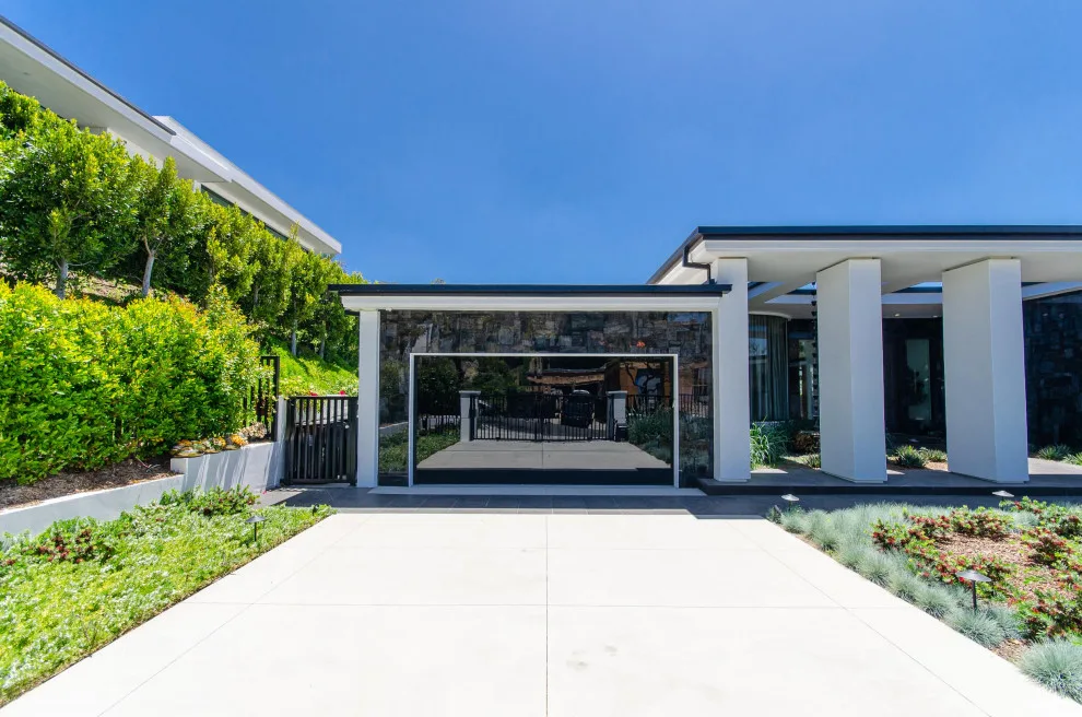 Contemporary Steel Gates and Panoramic Frameless Glass Garage Door by Pacific Garage Doors & Gates - Photo 2