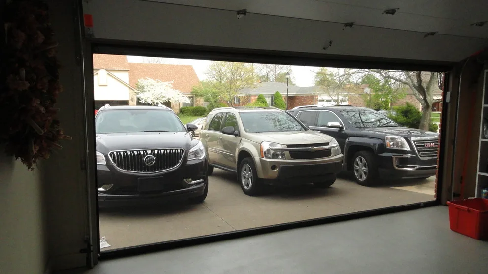 Automated Garage Screen by Tarnow Doors, Inc. - Photo 2
