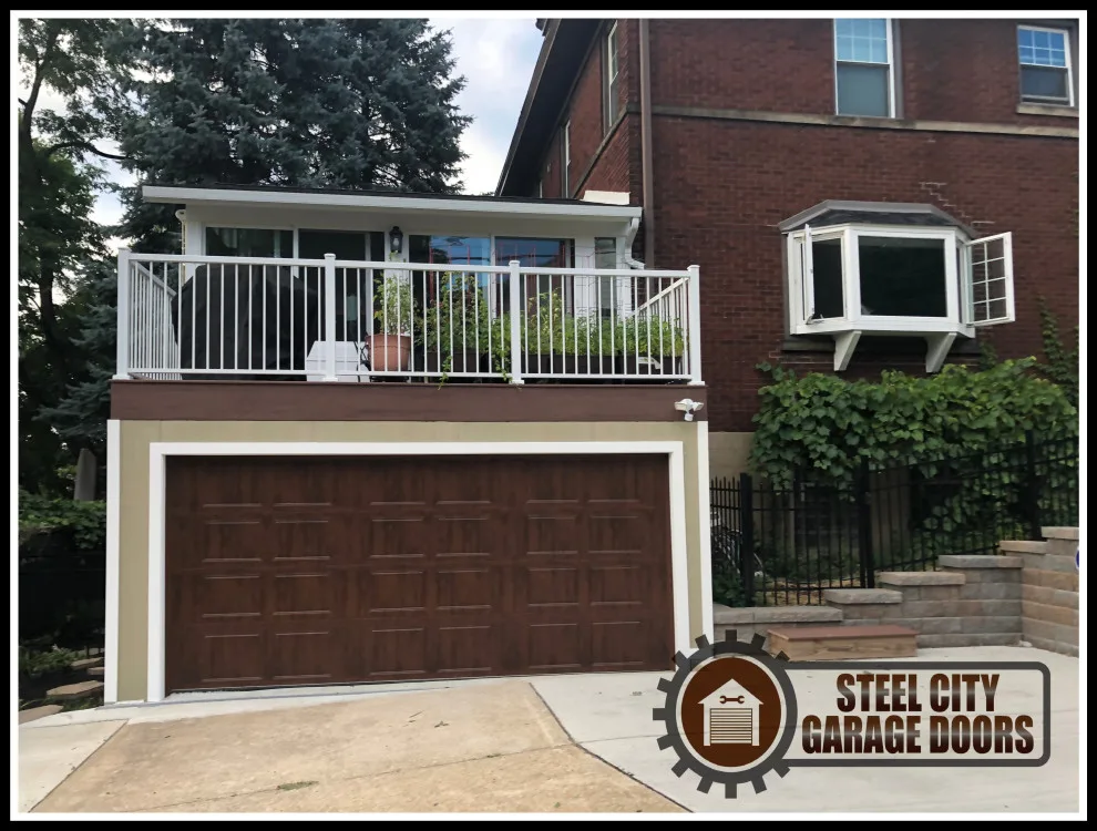Updated garage entrance by Steel City Garage Doors - Photo 10