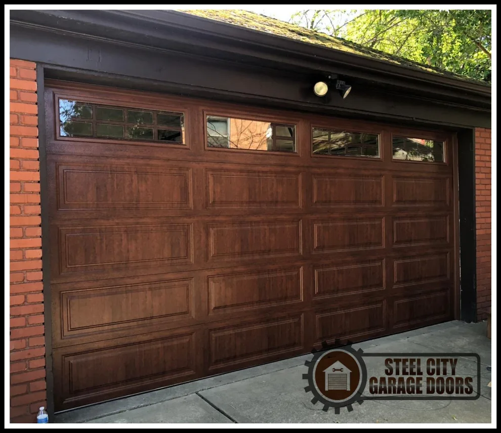 Updated garage entrance by Steel City Garage Doors - Photo 8