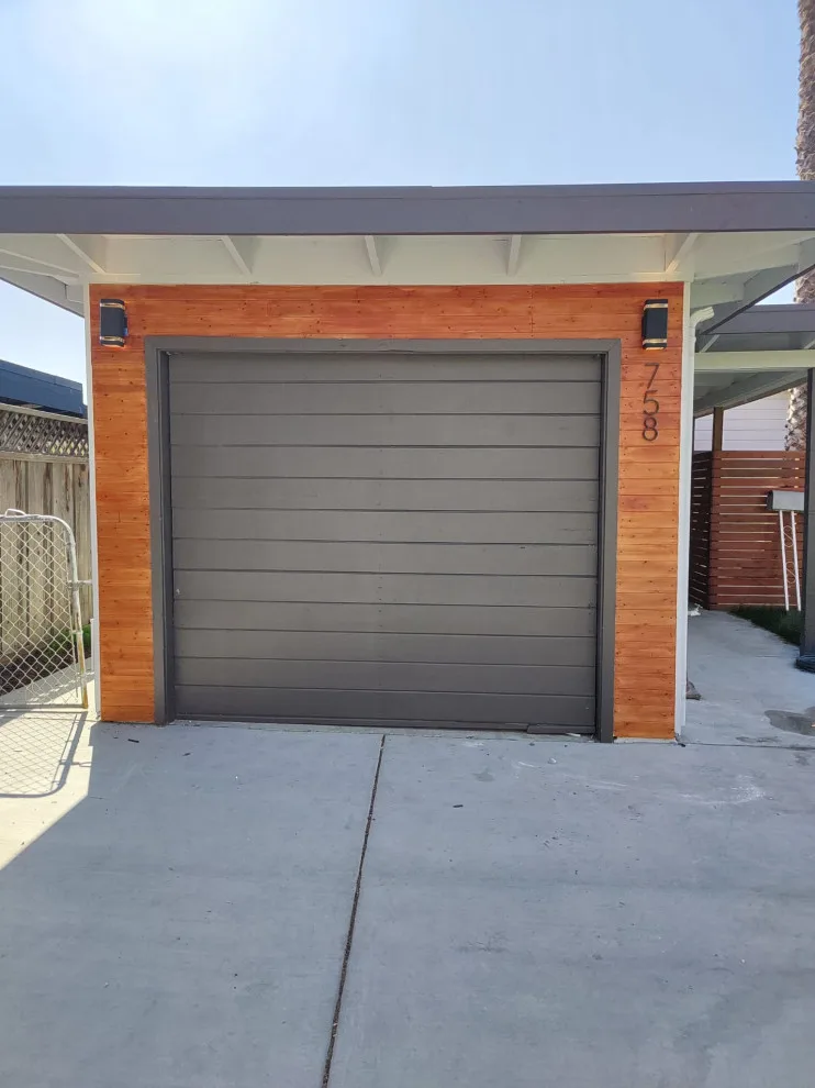 Single panel wooden door restoration by Allroads Overhead Garage Doors - Photo 14