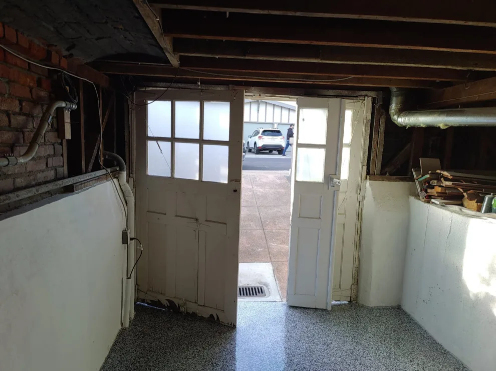 Single panel wooden door restoration by Allroads Overhead Garage Doors - Photo 5