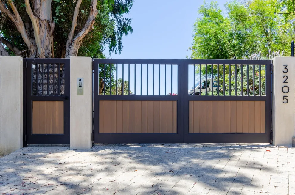 Gates of Steel and Redwood in Malibu by Pacific Garage Doors & Gates - Photo 3