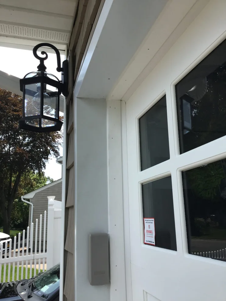 Classic White Carriage House Garage Door by Precision Garage Door Service - Photo 5