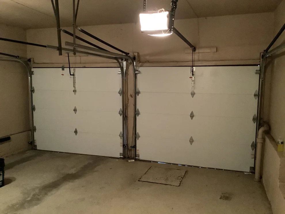 Walnut Traditional Raised Panel Garage Door by Precision Garage Door Service - Photo 2
