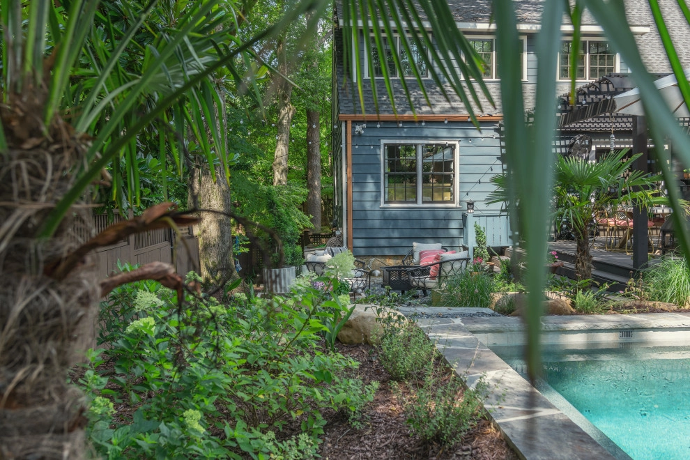 Backyard oasis with pool by City Garden Company - Photo 7