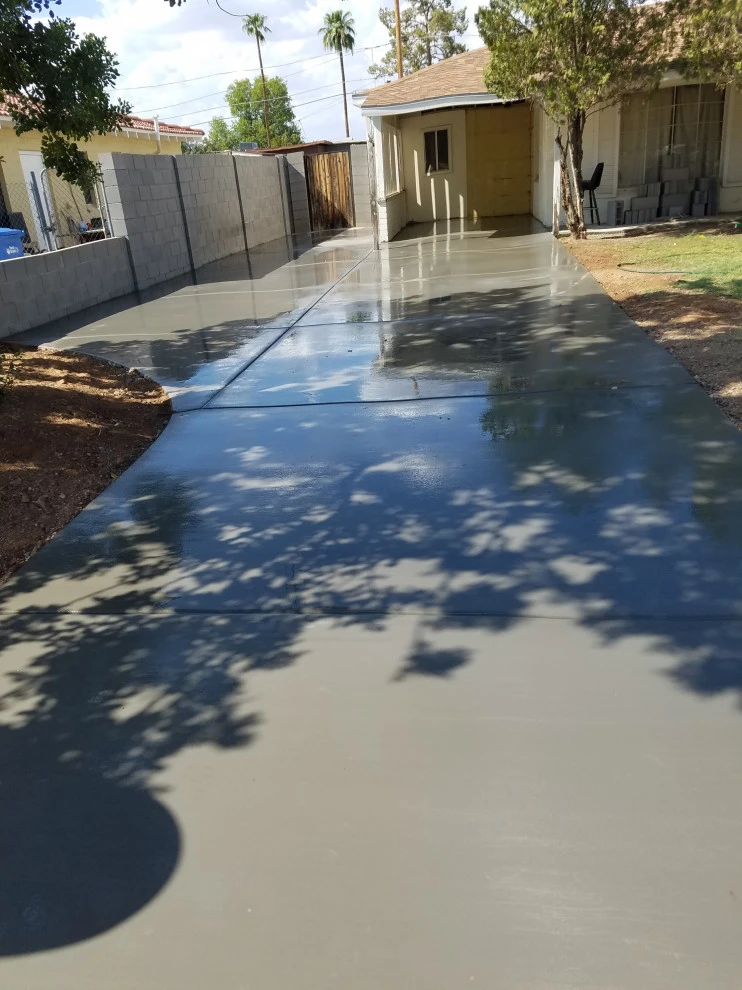 Add on concrete drive way by JM Landscaping Pros - Photo 5