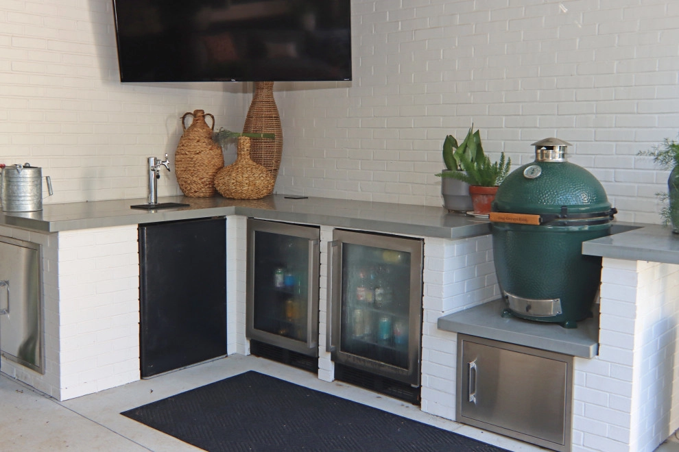 Modern patio with fireplace by City Garden Company - Photo 5