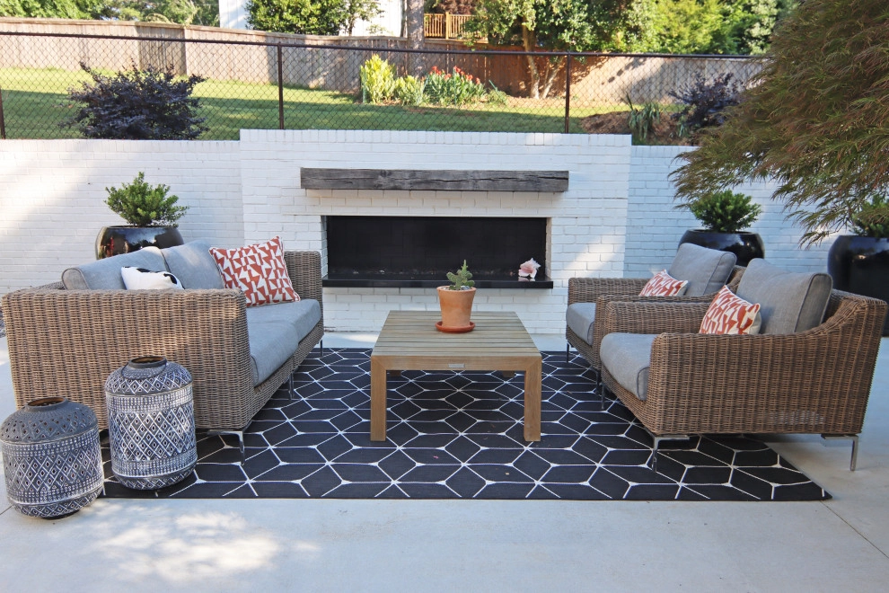 Modern patio with fireplace by City Garden Company - Photo 3