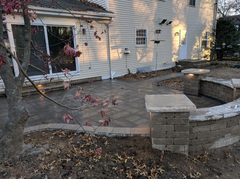 Valparaiso Backyard Patio with Landscape Lighting by NWI Patio Pros - Photo 7