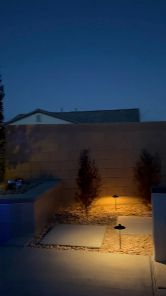 Landscape improvement on a backyard, a huge difference! Bigger better plants, wi by Mojave Land Maintenance - Photo 2