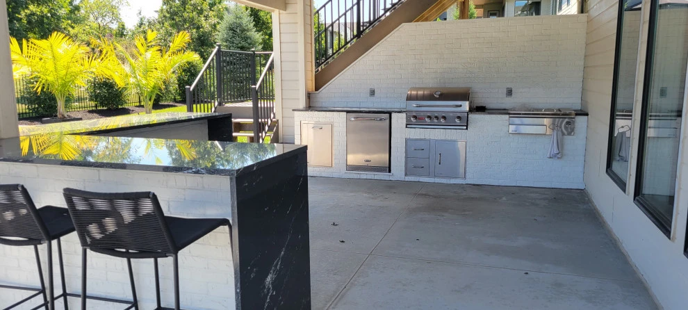 Outdoor kitchen spaces by Radik Landscape Construction INC - Photo 2