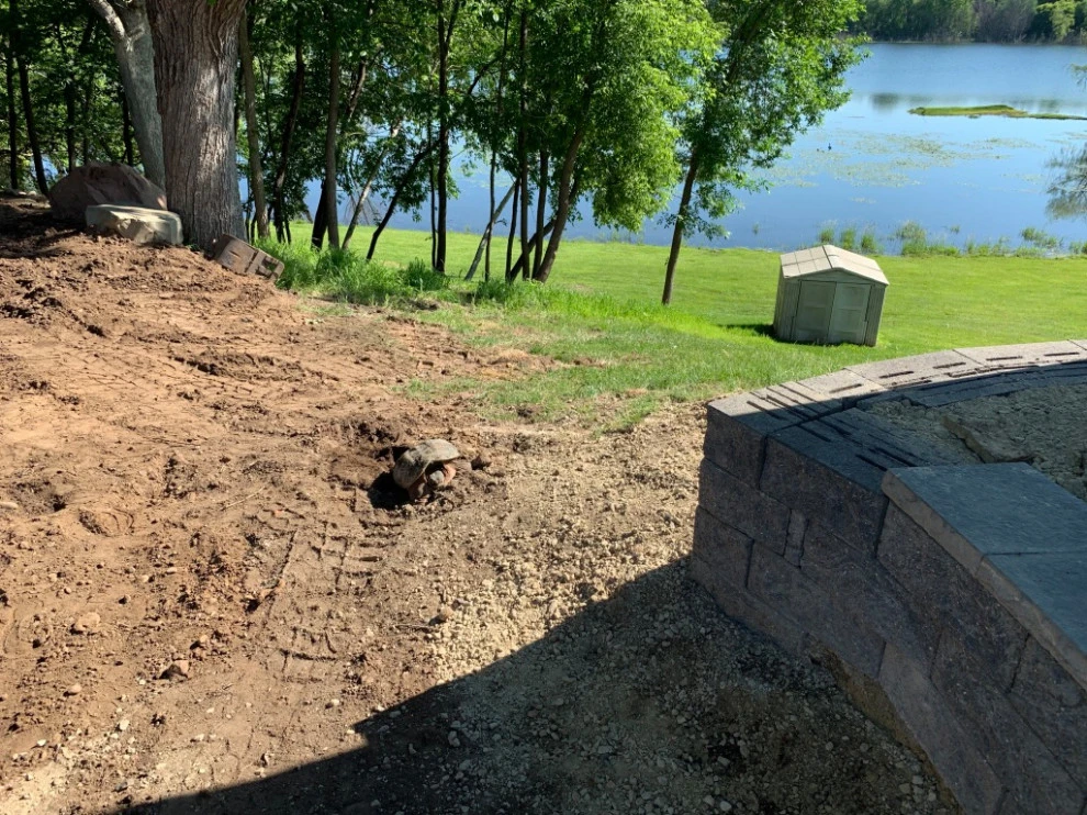 Large pool patio and wall with raised patio by South Metro Lawn And Landscape - Photo 13