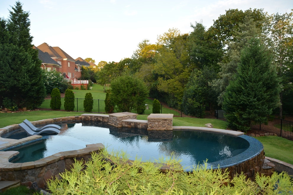Luxury Backyard by Crystal Pools LLC - Photo 9