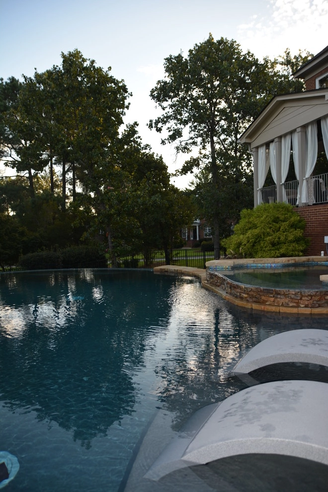 Luxury Backyard by Crystal Pools LLC - Photo 7