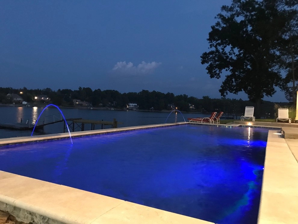 Luxury Backyard by Crystal Pools LLC - Photo 12