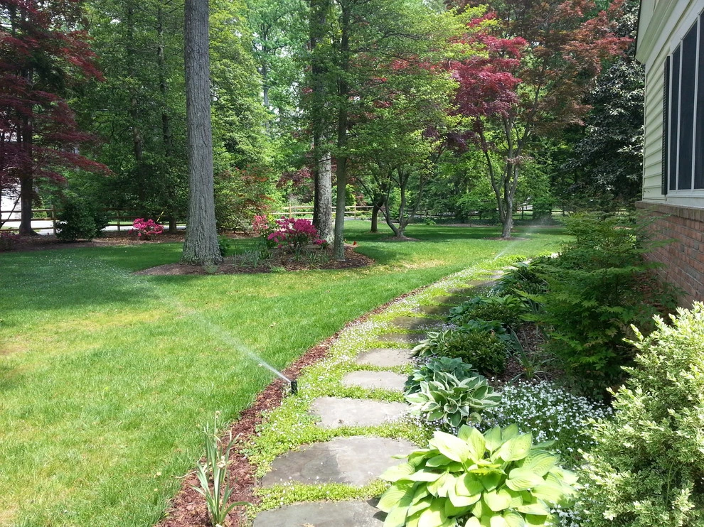 Large Front Yard Renovation by The Landscape Design Center - Photo 2