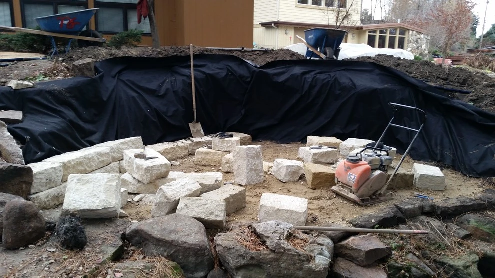 Creekside Natural Sandstone patio and retaining wall by Think Green, Inc. - Photo 2