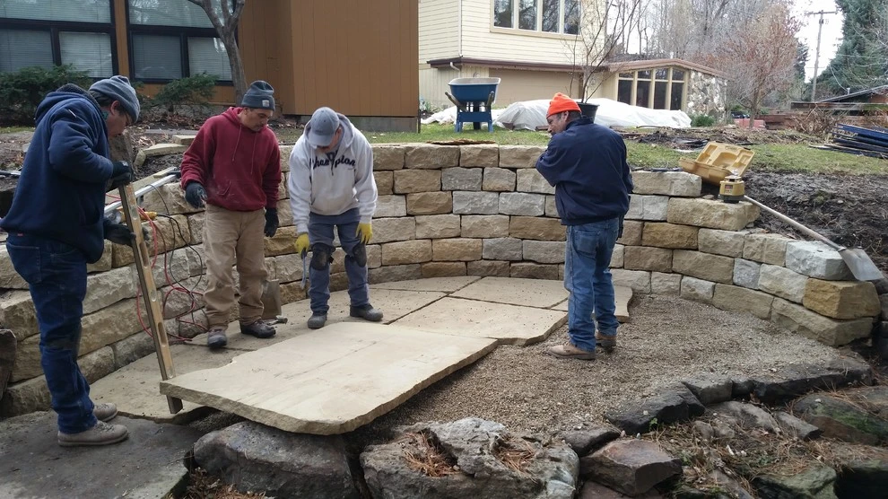 Creekside Natural Sandstone patio and retaining wall by Think Green, Inc. - Photo 4