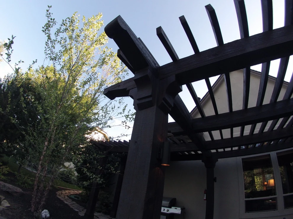 Cedar Pergola with Stone Seating by TLC Landscape - Photo 9
