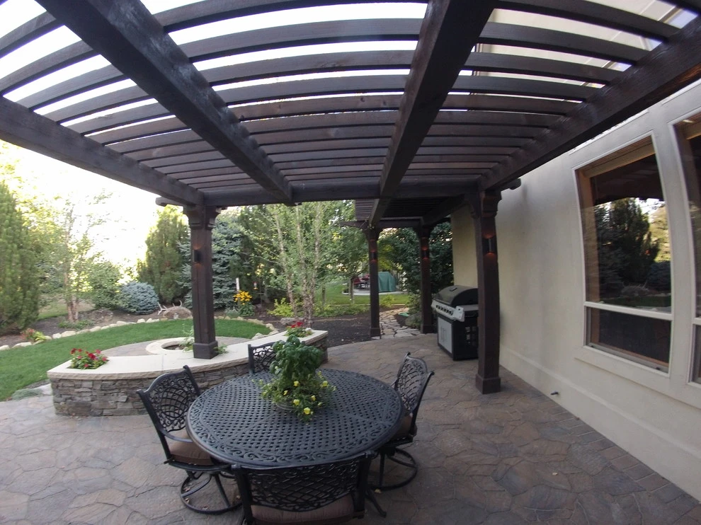 Cedar Pergola with Stone Seating by TLC Landscape - Photo 6