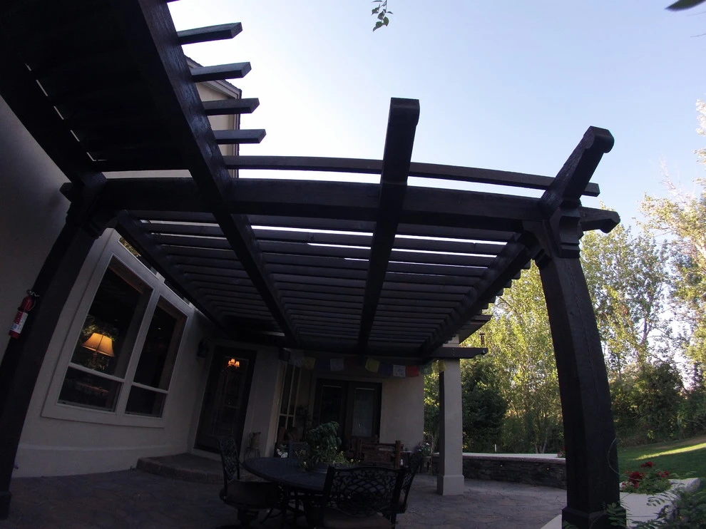 Cedar Pergola with Stone Seating by TLC Landscape - Photo 11