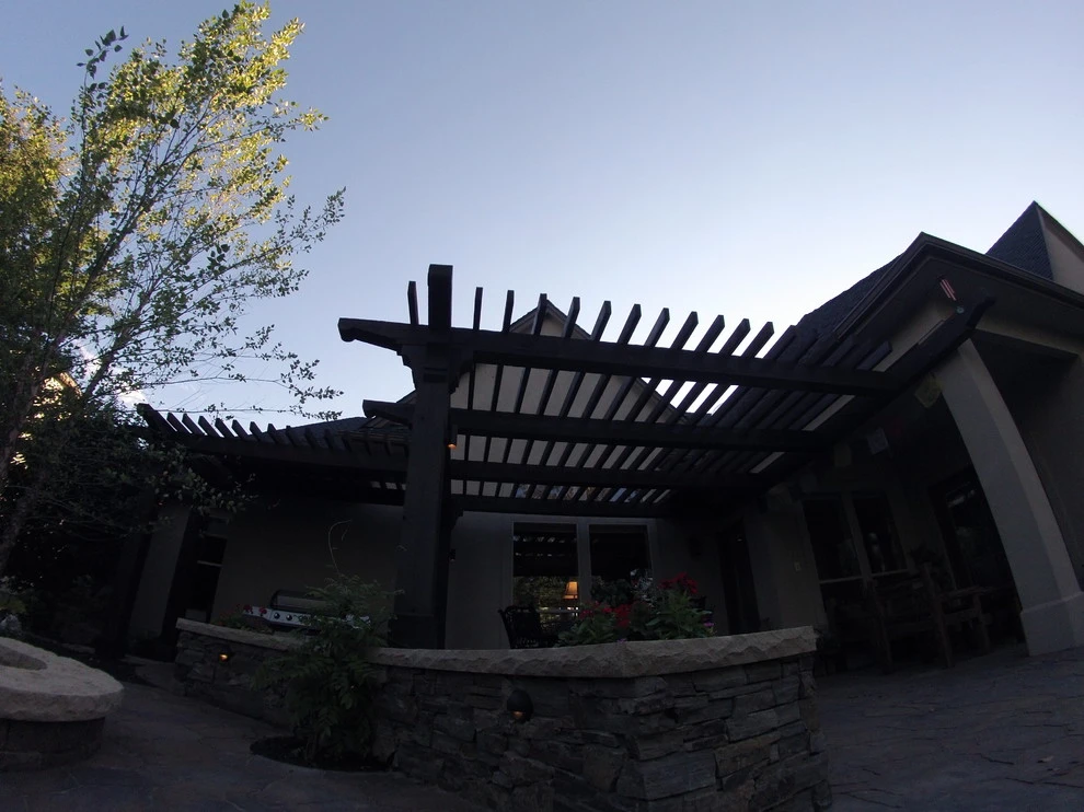 Cedar Pergola with Stone Seating by TLC Landscape - Photo 17