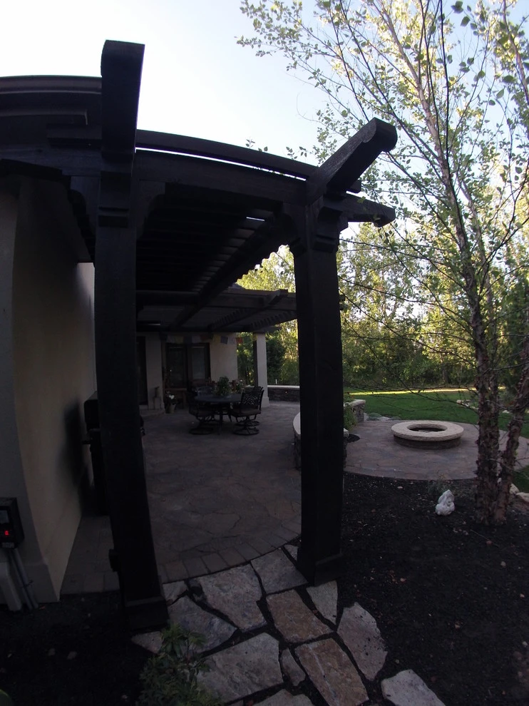 Cedar Pergola with Stone Seating by TLC Landscape - Photo 16